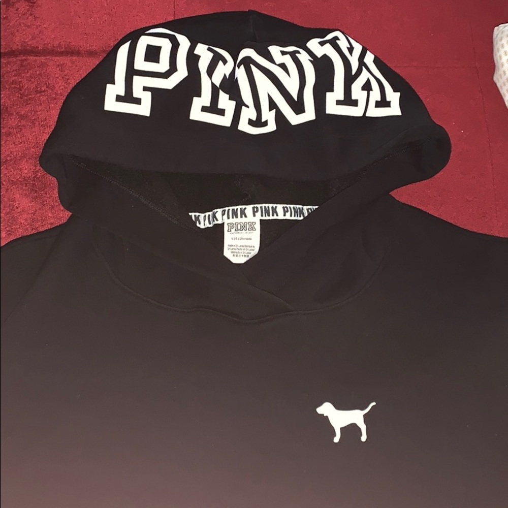 Pink black and white sweater